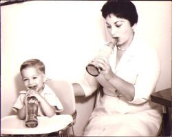 My mother and I drinking CocaCola